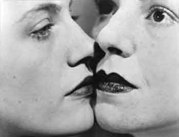 The kiss 1930 by Man Ray